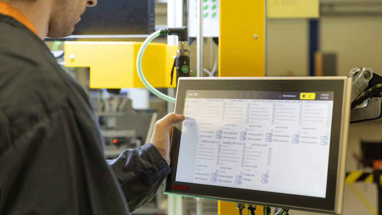 People and robots hand in hand – automation accelerates production, but human skills and knowledge remain irreplaceable. Photo: Hoob OÜ